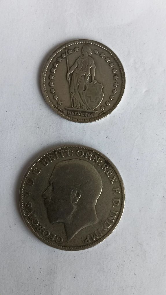 2 moedas de prata .francos suíços e florim