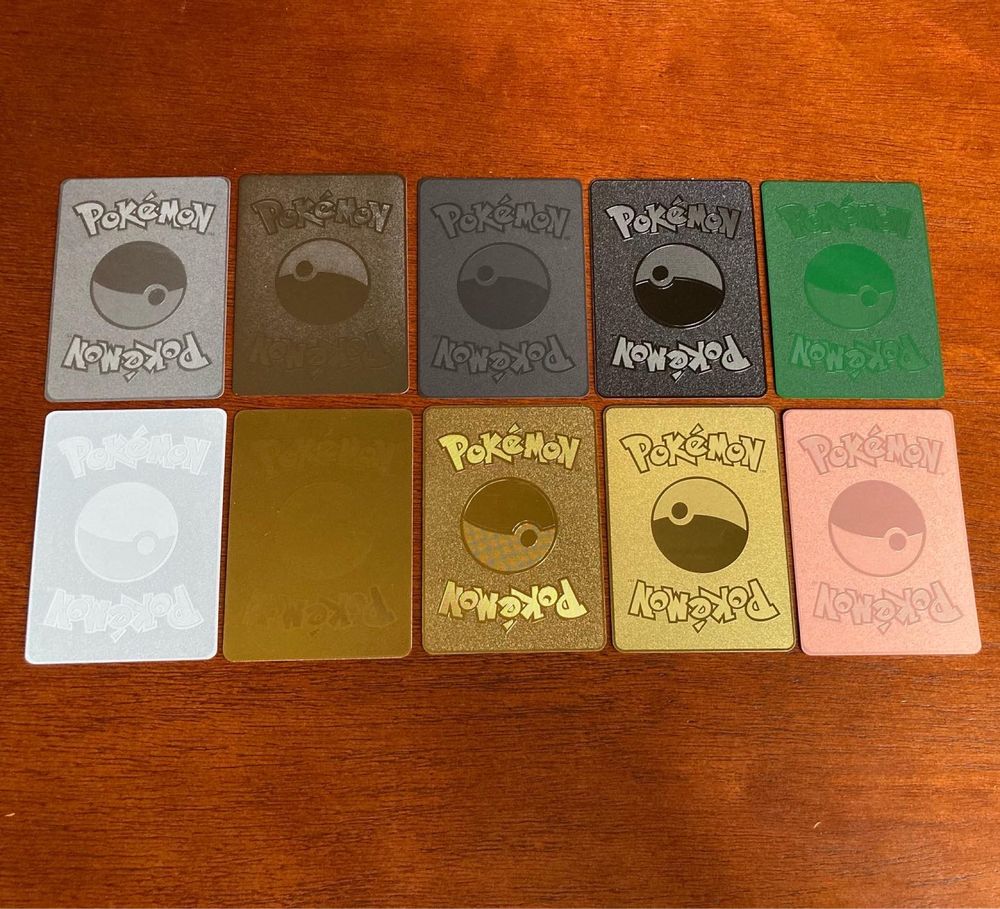 Cartas metalicas douradas e prateadas pokemon