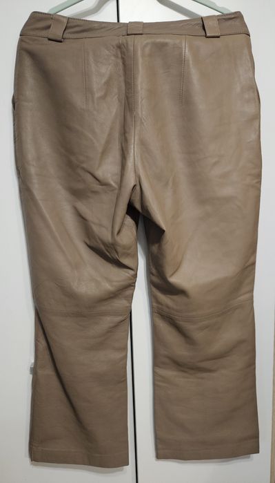Beżowe spodnie Ochnik skórzane skóra