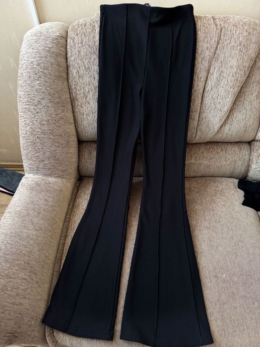 Штани кльош чорні