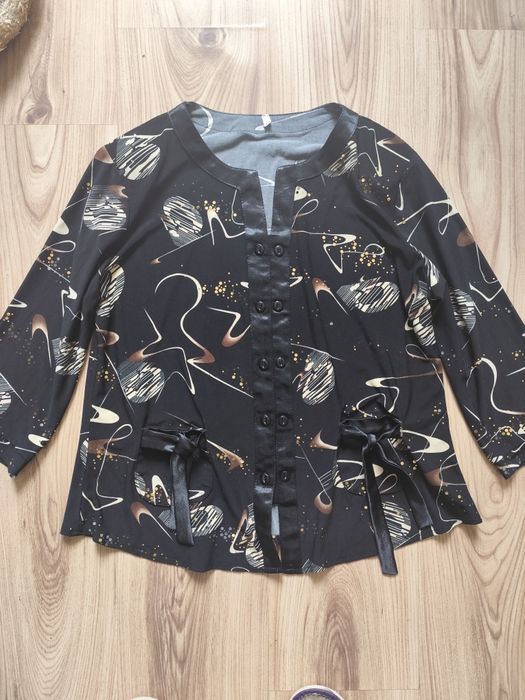 Żakiecik czarny z złotymi cekinami