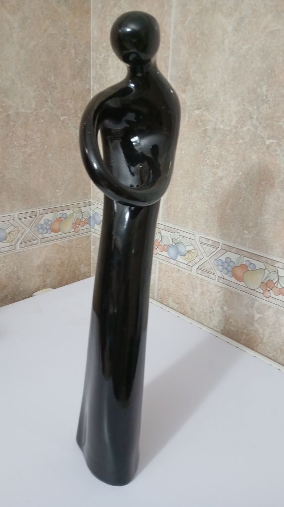 Estatueta em preto
