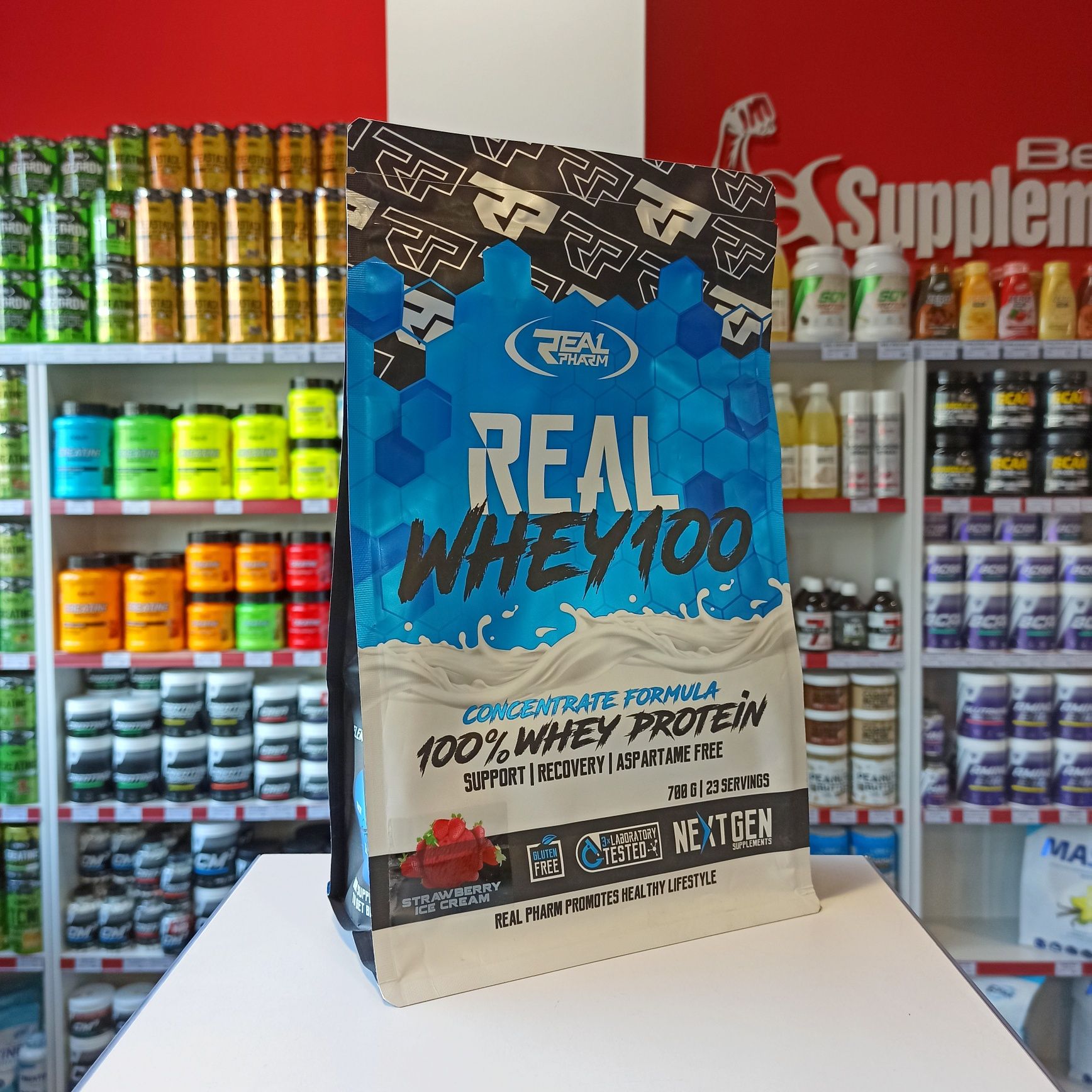 Real Pharm Real Whey 700g Białko WPC Odżywka Białkowa lody truskawkowe