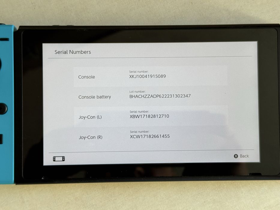 Nintendo Switch V2, idealny stan, duzy zestaw, JoyCon grip, strap,32GB