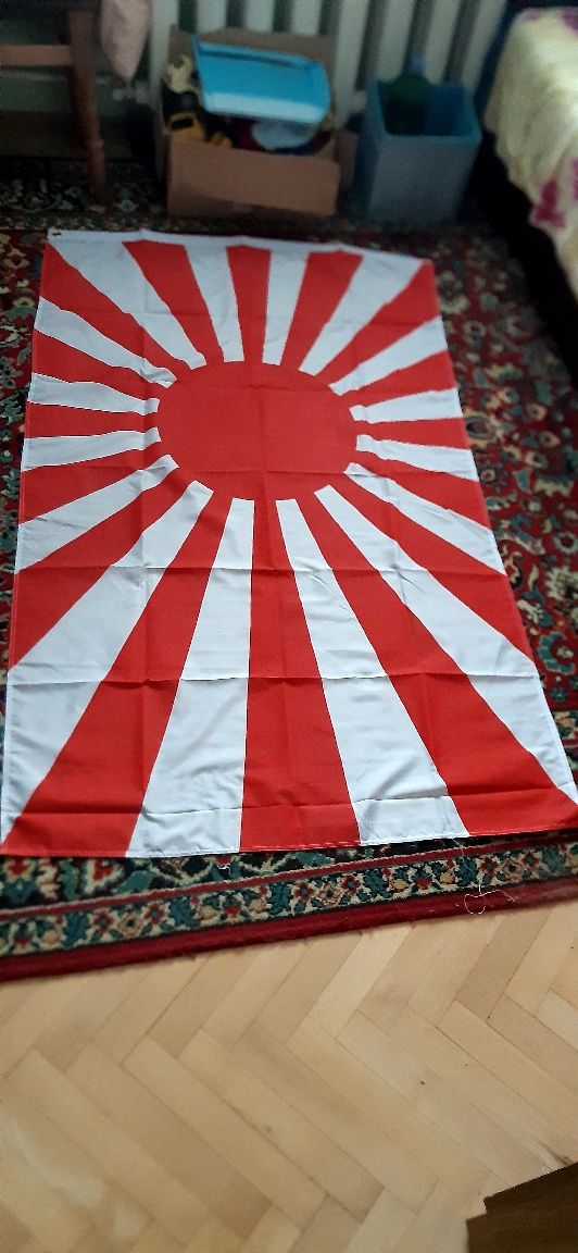 Флаг милитаристской Японии,новый.Размеры 90  х 150 см.С люверсами,поли