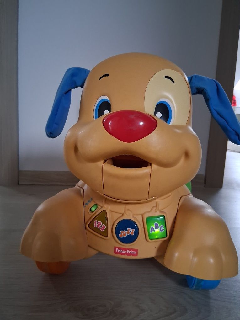 Piesek jeździk Fisher Price