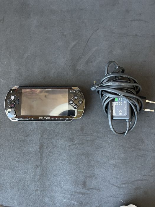 PSP-1004 (Modificada, 64GB) + carregador original