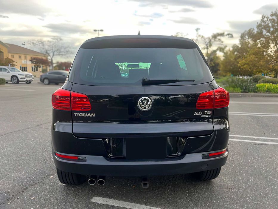 Volkswagen Tiguan      2014