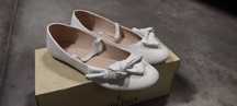 Buty białe baleriny