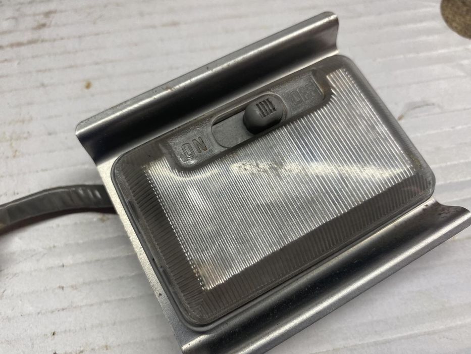 Плафони заглушки світильники кріплення вимикачі світла салону Лансер 9