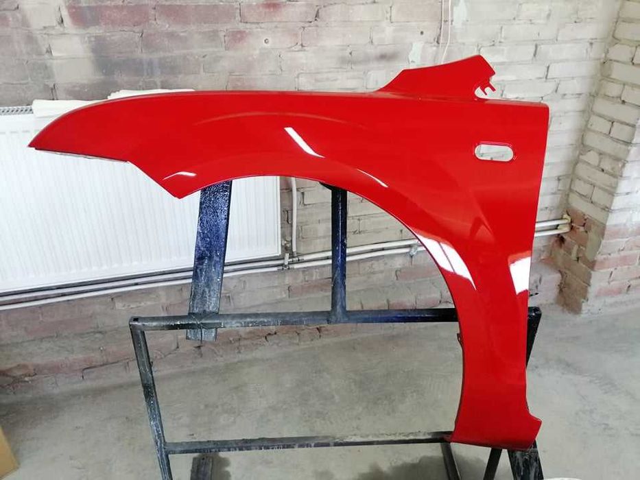 Błotnik FORD FOCUS MK II 2 04-08r kolor COLORADO red C0
