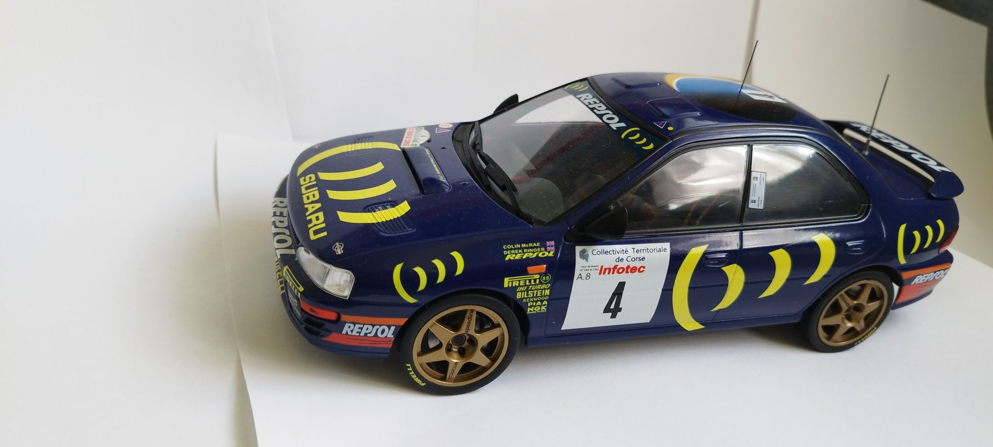 Subaru Impreza 555 #5 C.Sainz TdC 1995 1:18 Ixo