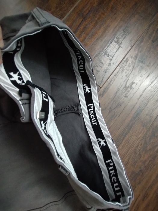 Bryczesy Pikeur szare z długim lejem S 36