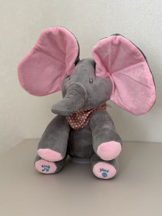 Плюшевий співаючий слоник