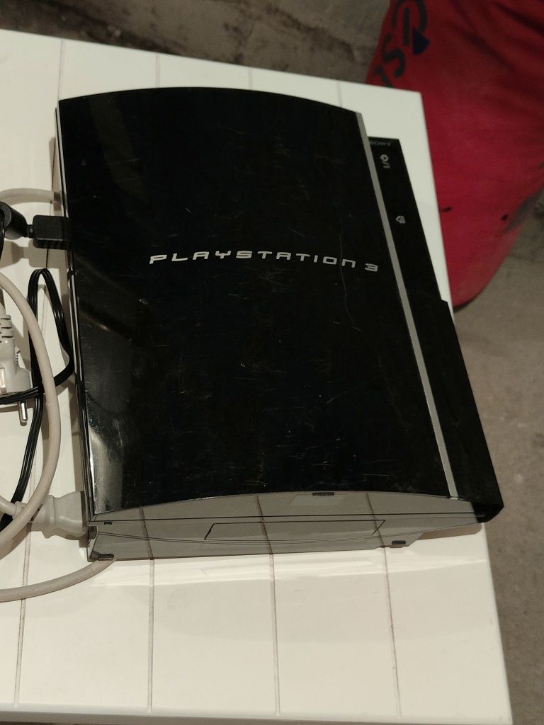 Konsola PlayStation 3 + 2 gry