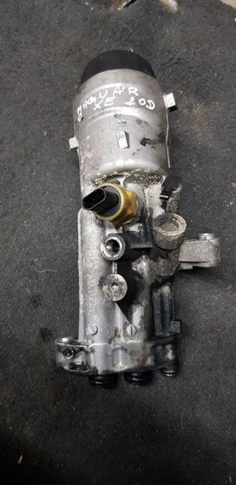 OBUDOWA PODSTAWA FILTRA OLEJU JAGUAR XF XE RANGER ROVER  2.0D G4D3-6714-C77A