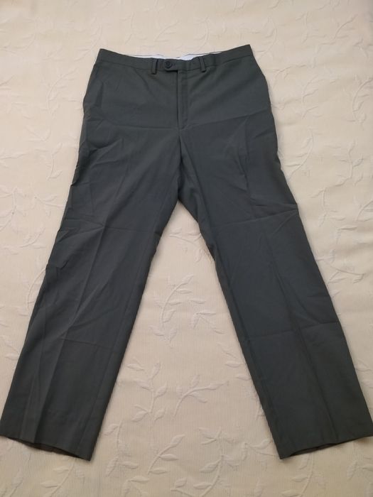 Calças Emidio Tucci, marcas de uso nas fotografias