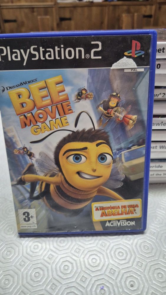 playstation 2 com varios jogos