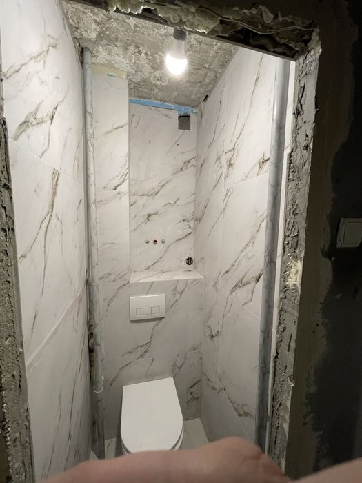 Шпаклівка,укладання плитки,ламінату