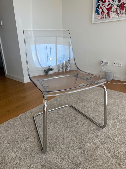 4 transparent dinning chairs