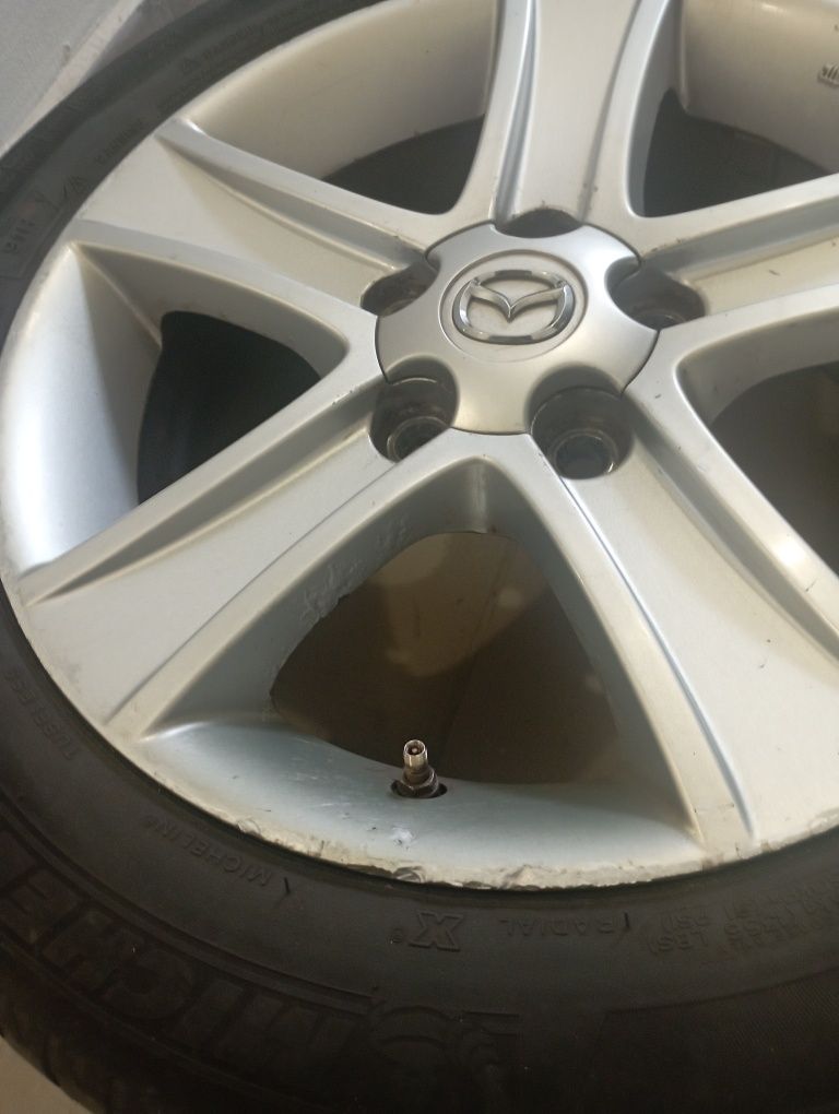 Продам фирменные диски с авто Мазда 16".