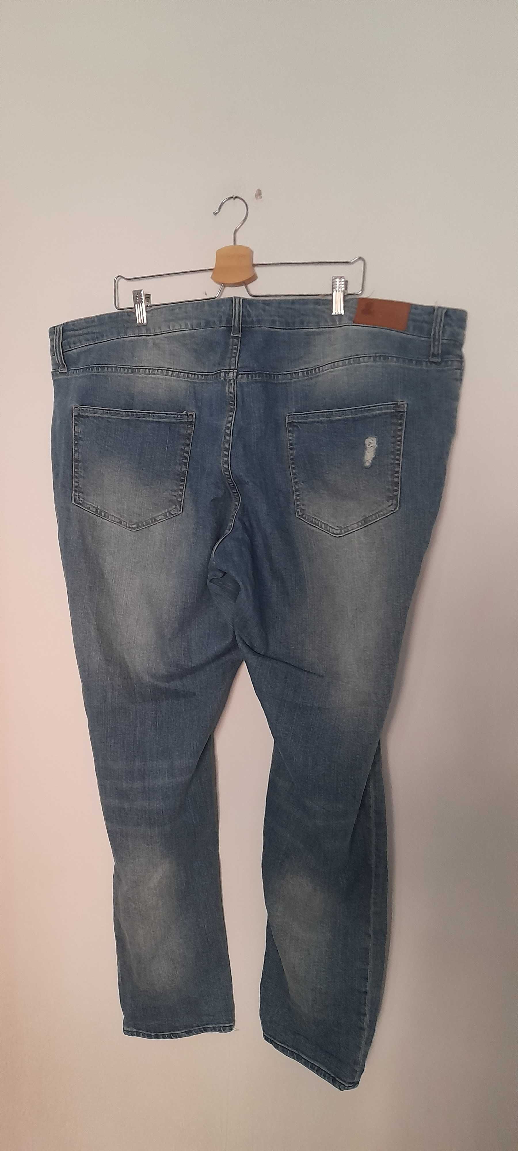 H&M Niebieskie jeansy rurki skinny z dziurami wysoki stan 52