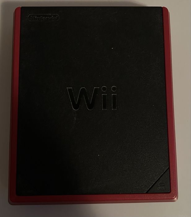 Nintendo Wii mini com 3 comandos e 2 jogos