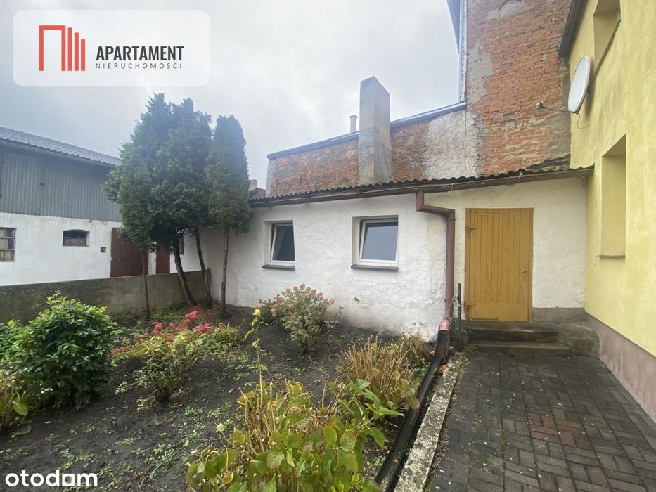 Przestronna kamienica z garażami w mieście