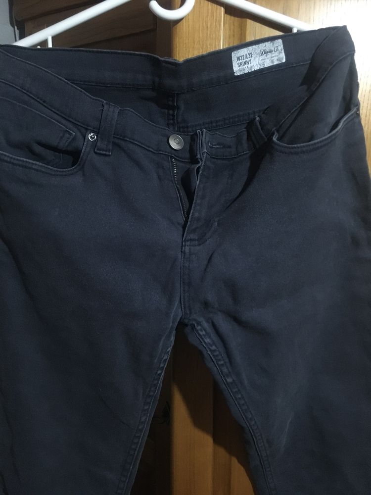Calças azuis escuras denim.co