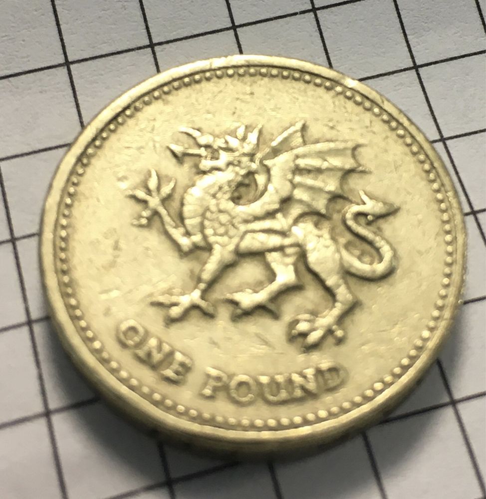 ONE pound монета