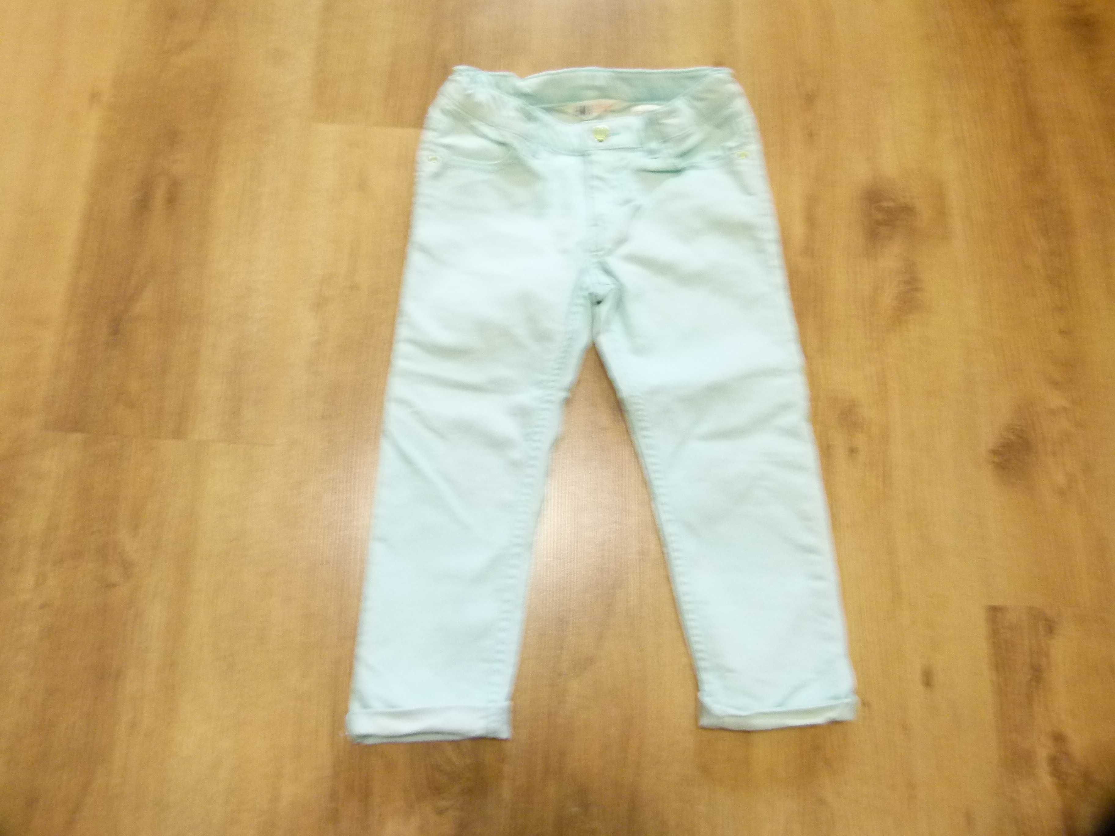 rozm 122 H&M spodnie jeans jasny niebieski turkusowy długość 3/4