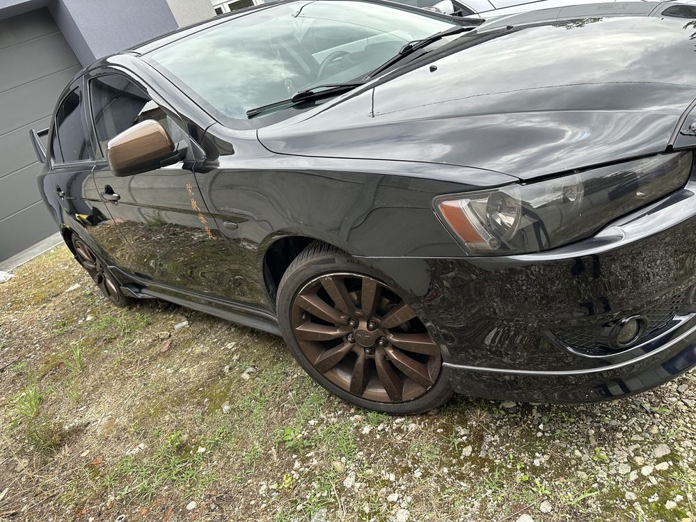 Mitsubishi Lancer 2012 oszczędny zrobiony na styl EVO przebieg 63771km