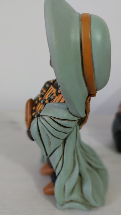 Casal de africanos pintados à mão