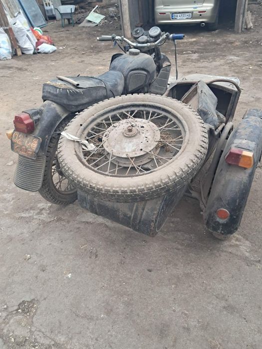 Дедушки мотоцикл стоял