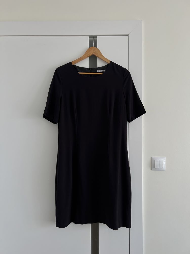 czarna elegancka sukienka midi