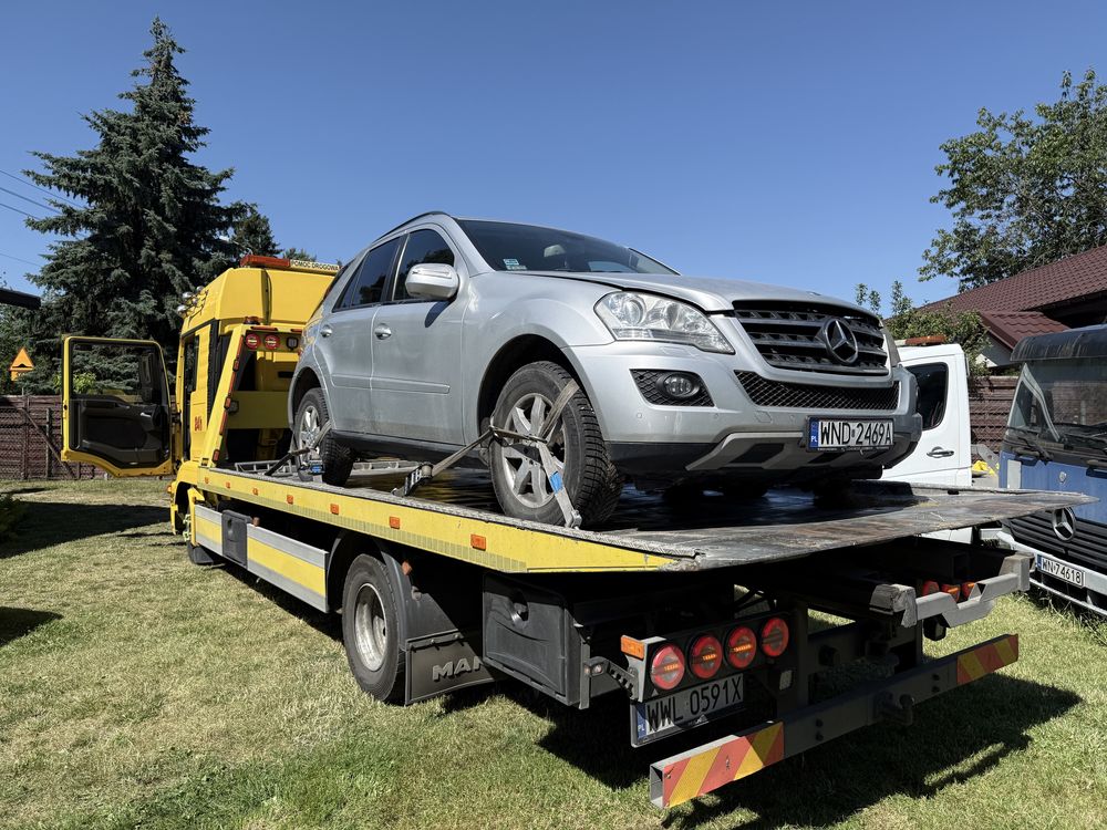 Pomoc drogowa, holowanie, autolaweta, transport aut, transport wózków