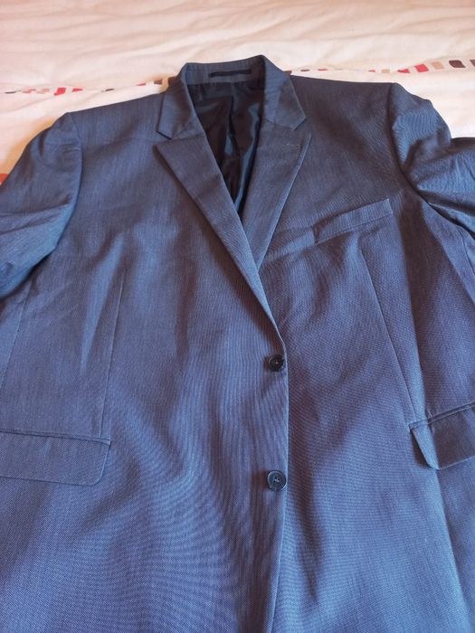 Casaco cinza  da parte do blazer