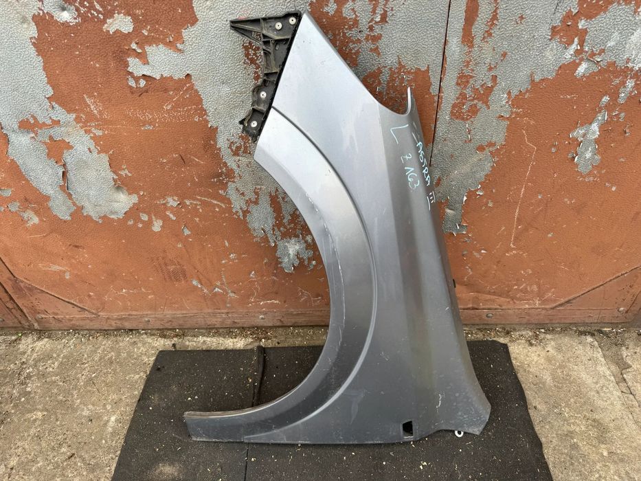 Błotnik lewy Opel Astra III H Z163