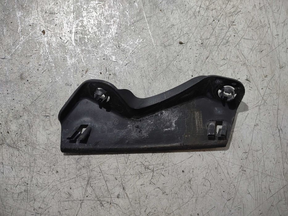 Mocowanie błotnika lewy przód VW PASSAT B6