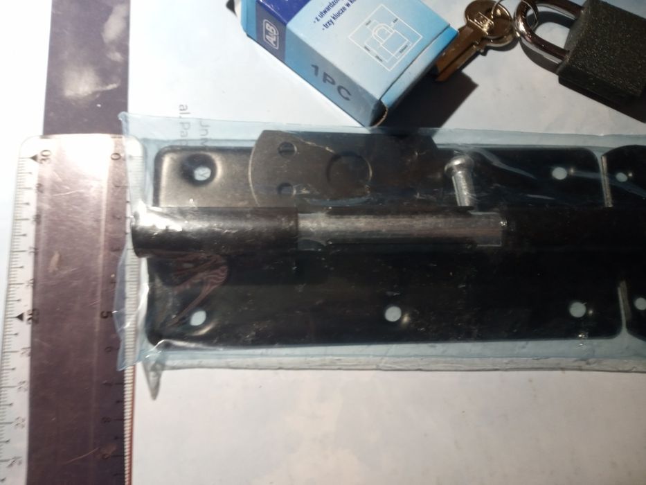 Nowa zasuwka uniwersalna, skobel