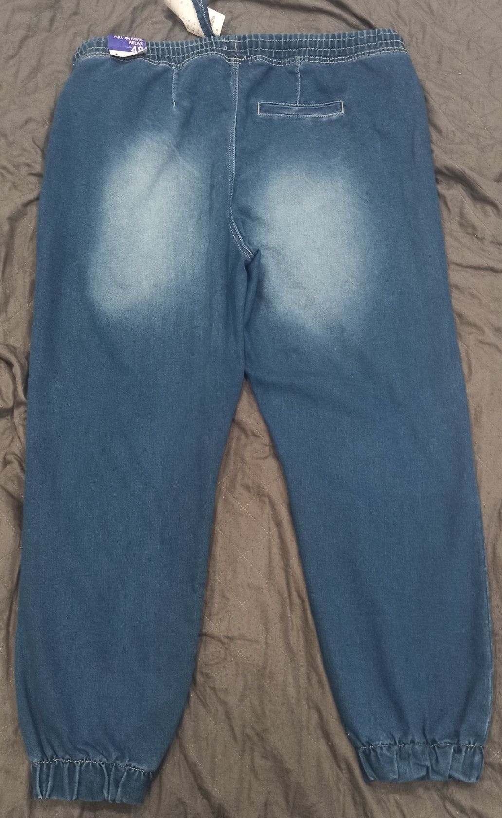 Nowe spodnie jeansowe 48 gumka w nogawce