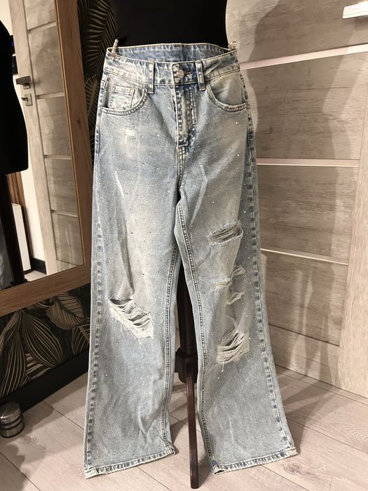 Spodnie jeansowe z przetarciami