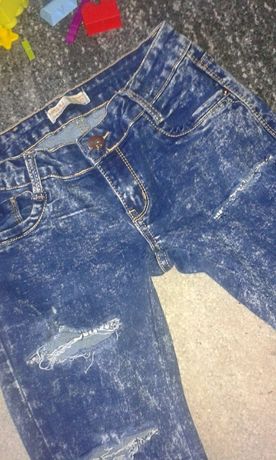 Spodnie jeansy rurki dziury s obcisle