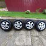 Felgi Opel Astra H R15 5x110 z oponami letnimi