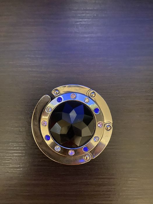 Компактний сумкотримач