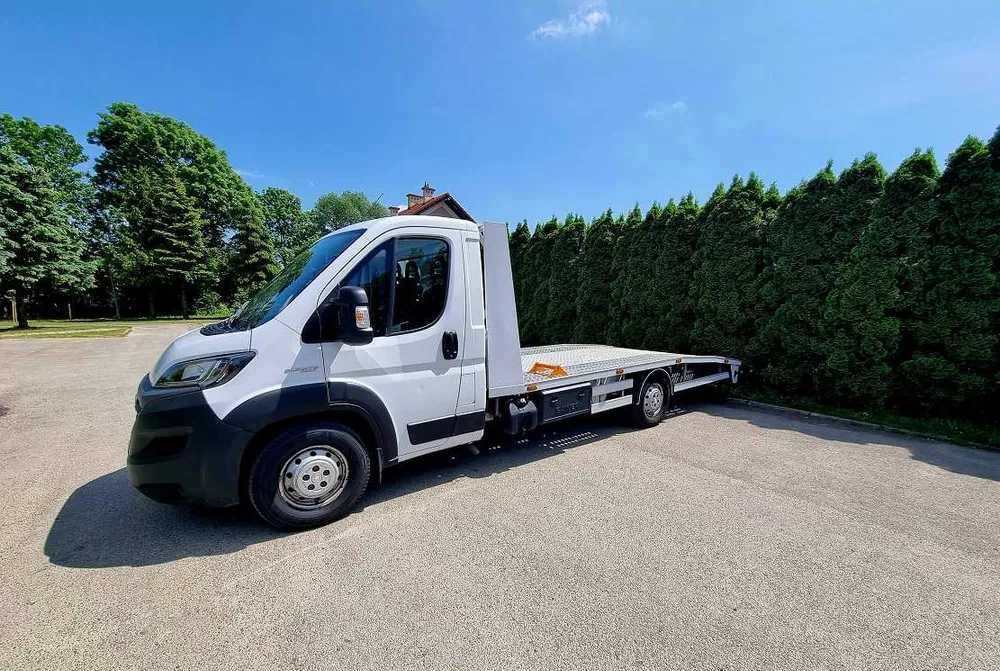 Pomoc Drogowa Holowanie Laweta awaryjne odpalanie transport