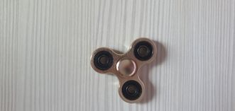 Oryginalny fidget spiner złoty