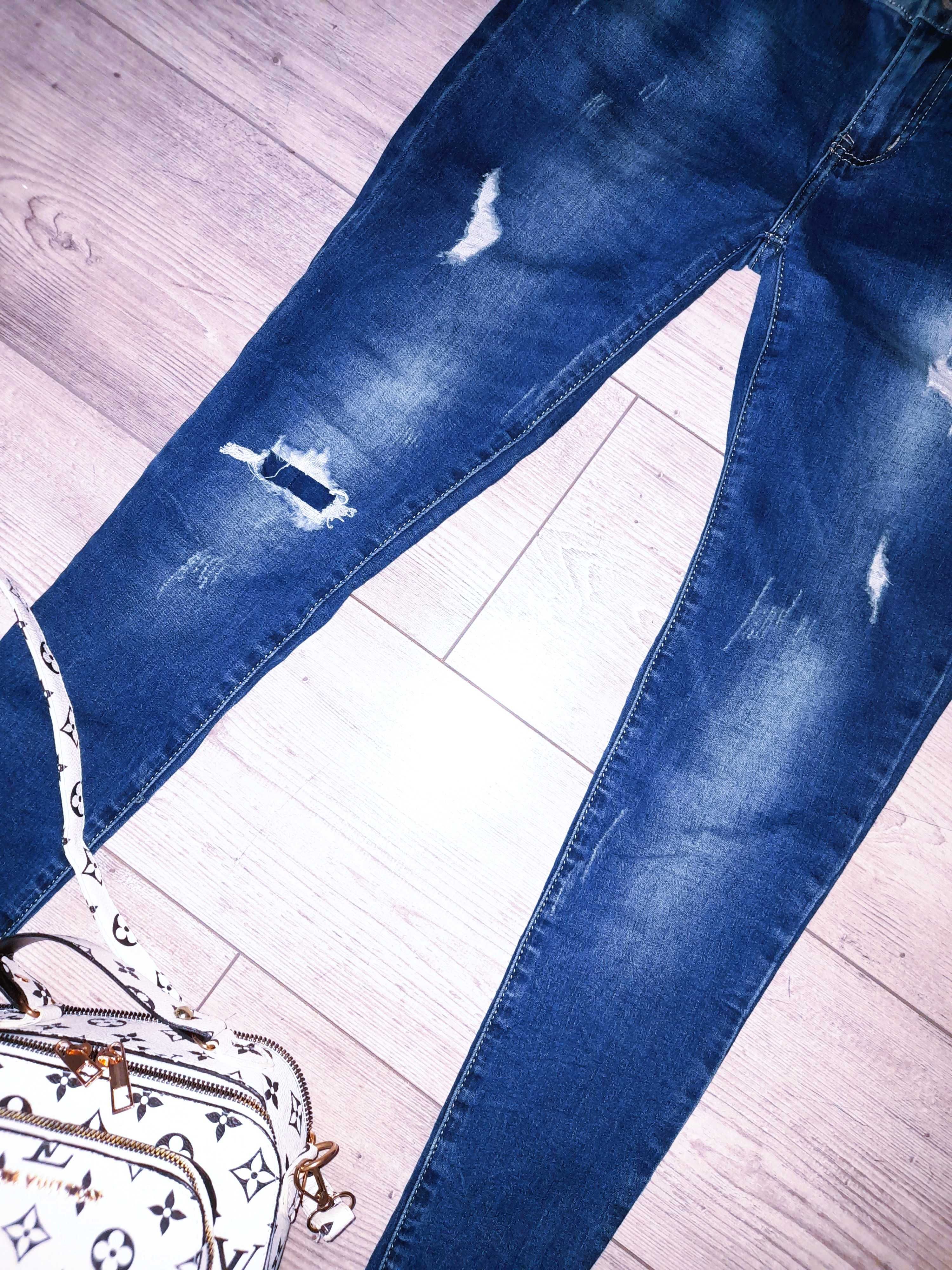 Granatowe jeansy rurki z przetarciami rozm.M