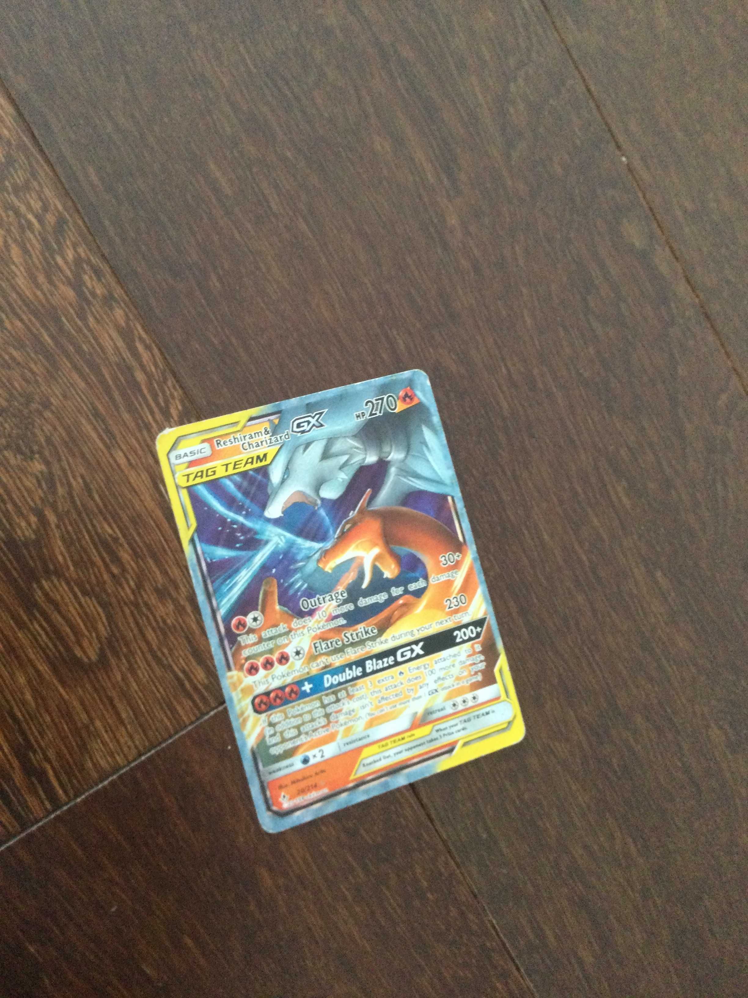 Carta Pokemon reshiram e charizard	gx	fogo