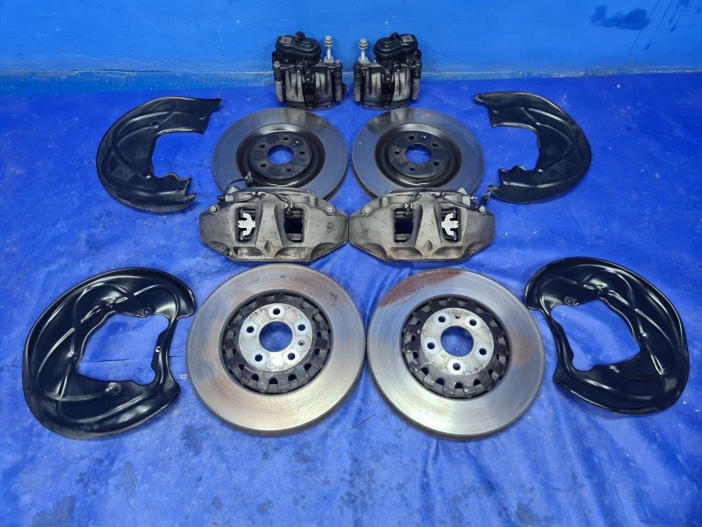 KOMPLET tarcz 375mm 340mm zaciski 6-tłoczkowe AUDI Q7 4M A6 C7 C8 OEM